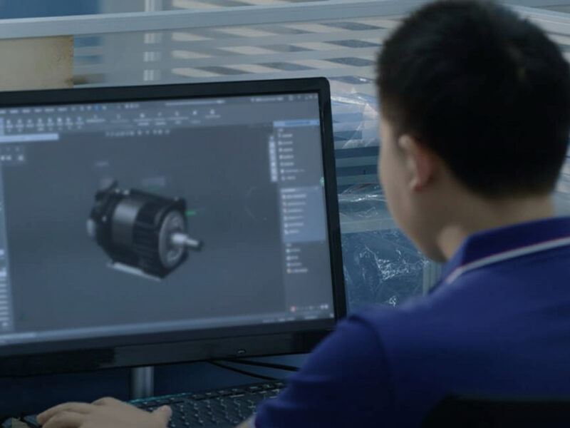 Experienced engineer designing a custom BLDC motor using 3D CAD software, representing direct factory engineering support and secure development.